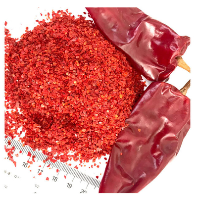 Heiße, scharfe, rote Paprika, zerkleinerte Rohstoffe für Gewürze aus einzelnen Kräutern