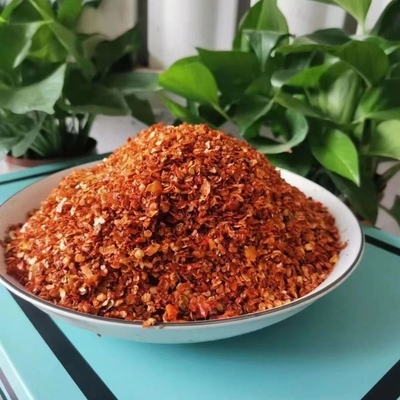 Heiße, scharfe, rote Paprika, zerkleinerte Rohstoffe für Gewürze aus einzelnen Kräutern