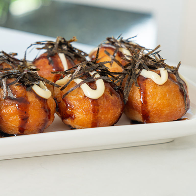 Köstliche Takoyaki-Achseballen für die Bequemlichkeit und Authentizität